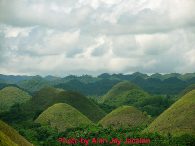 a beautiful sky and scenary of chocolate hills